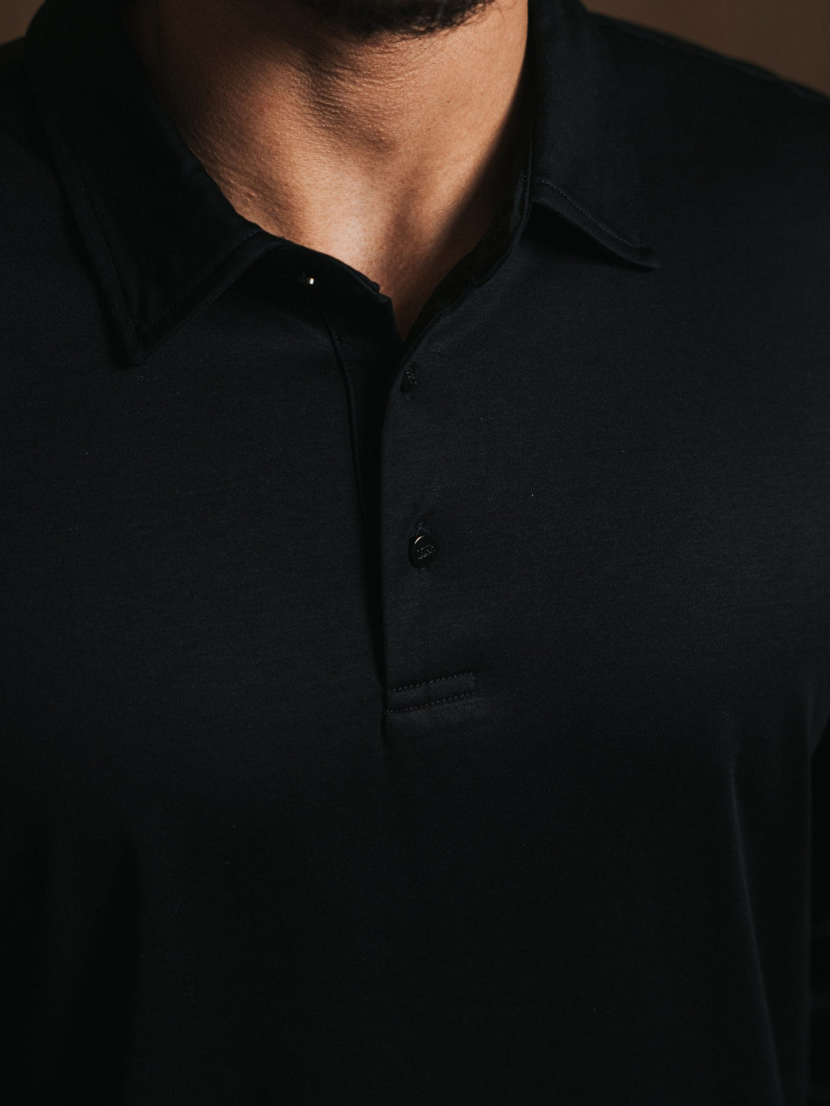 Glans polo met lange mouwen
